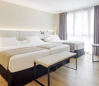 Habitación triple ( 3 adultos) Hotel ILUNION San Sebastián Habitación triple ( 3 adultos) Hotel ILUNION San Sebastián