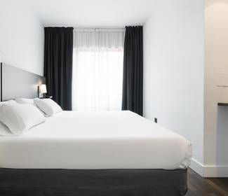 Habitación triple Hotel ILUNION Suites Madrid Habitación triple Hotel ILUNION Suites Madrid