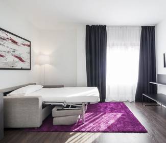 Habitación triple Hotel ILUNION Suites Madrid Habitación triple Hotel ILUNION Suites Madrid