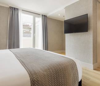 Habitación junior suite ( 2 adultos + 1 niño) Hotel ILUNION San Sebastián Habitación junior suite ( 2 adultos + 1 niño) Hotel ILUNION San Sebastián