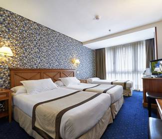 Habitación triple ( 3 adultos) Hotel ILUNION San Sebastián Habitación triple ( 3 adultos) Hotel ILUNION San Sebastián