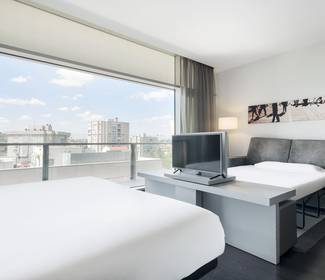 Habitación familiar Hotel ILUNION Atrium Madrid Habitación familiar Hotel ILUNION Atrium Madrid