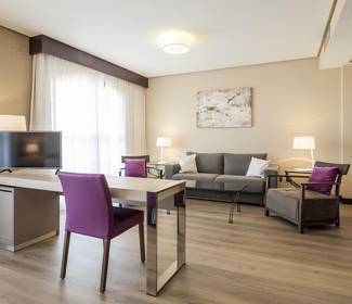 Habitación suite Hotel ILUNION Golf Badajoz