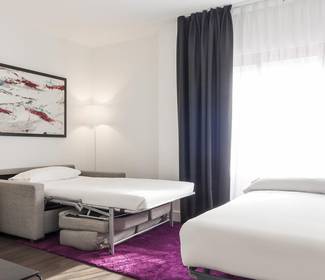 Habitación cuádruple Hotel ILUNION Suites Madrid Habitación cuádruple Hotel ILUNION Suites Madrid